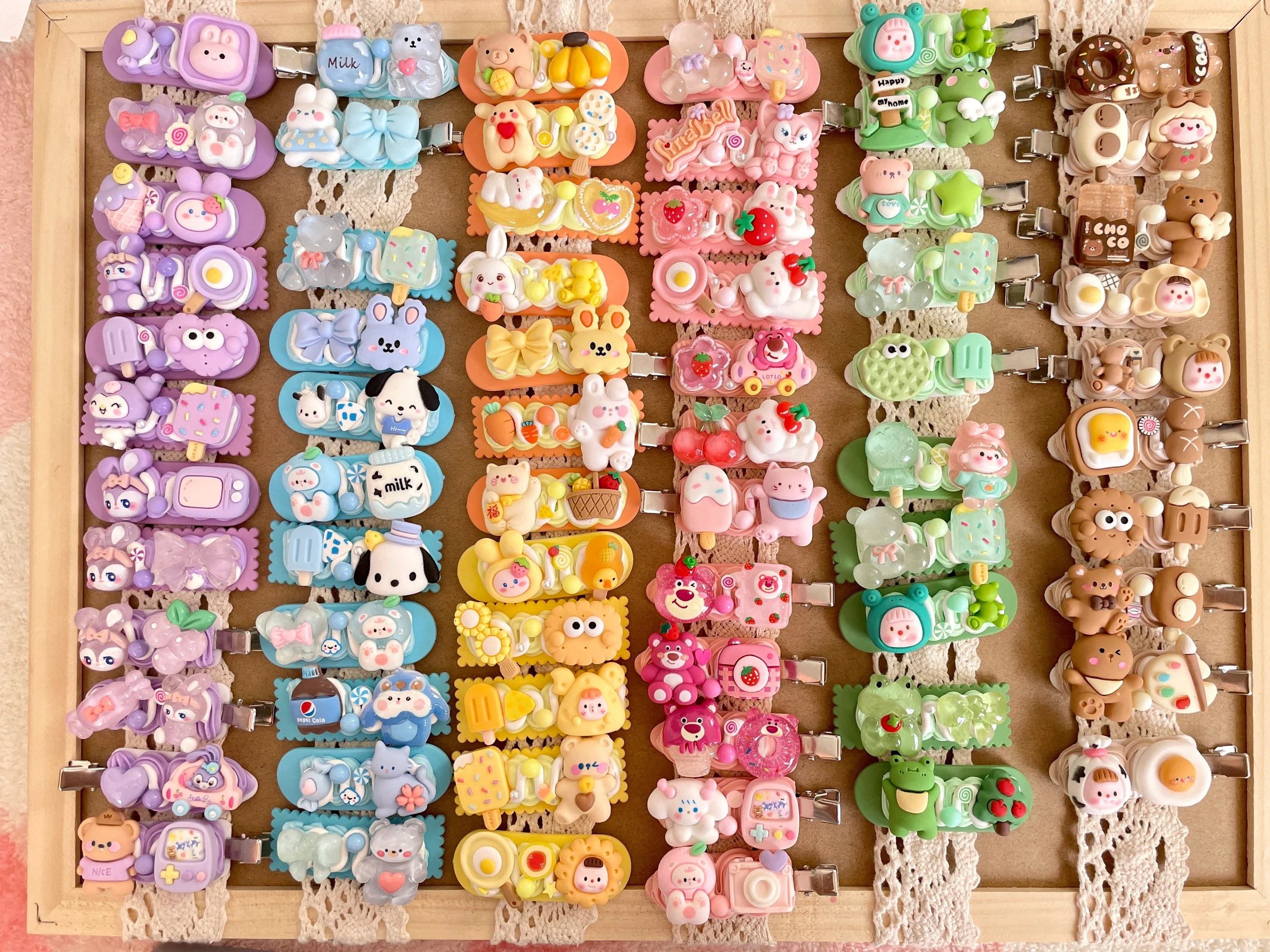 Colourful decoden hair clips decorated with character charms
