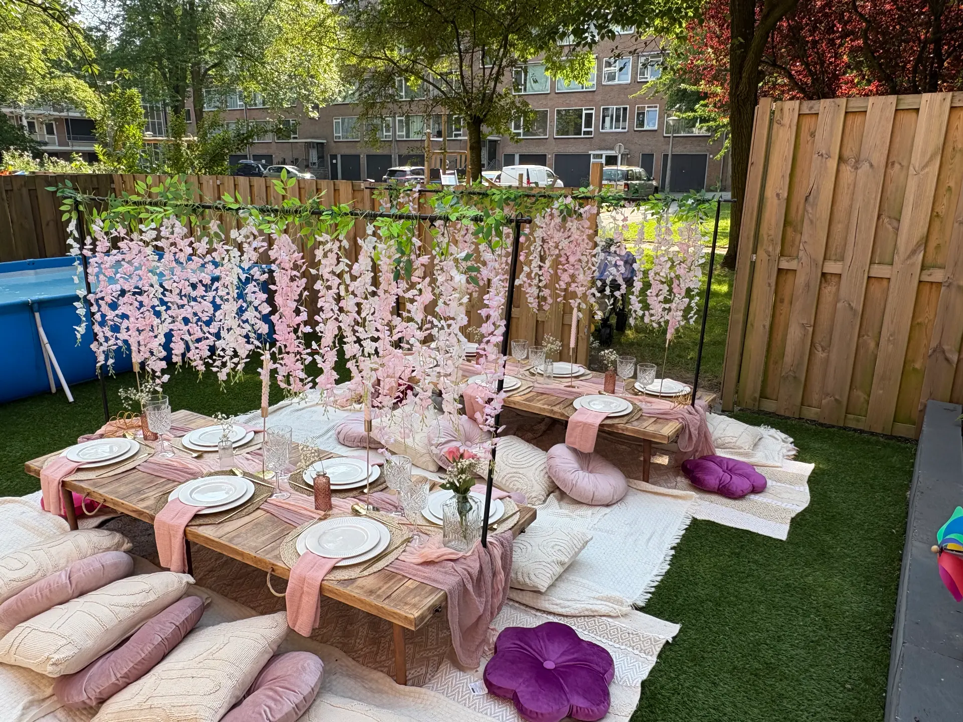 Blush children’s tables styled with cascading flowers