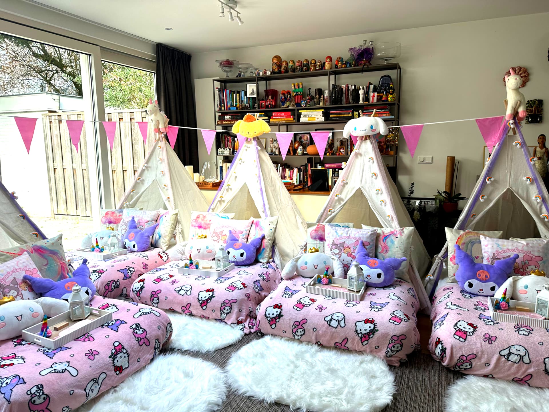 Sweet Sanrio Dreams teepee sleepover with pink character bedding, plush cushions and styled beds