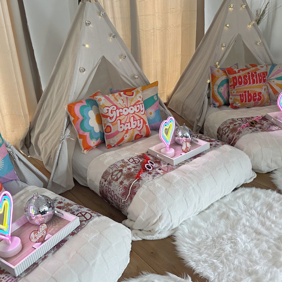 Groovy themed teepee sleepover styling