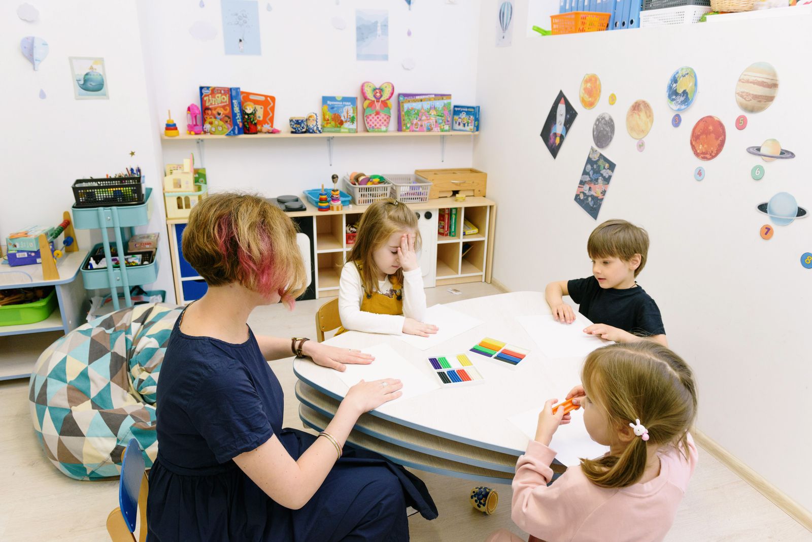 Children taking part in a colourful hosted creative activity